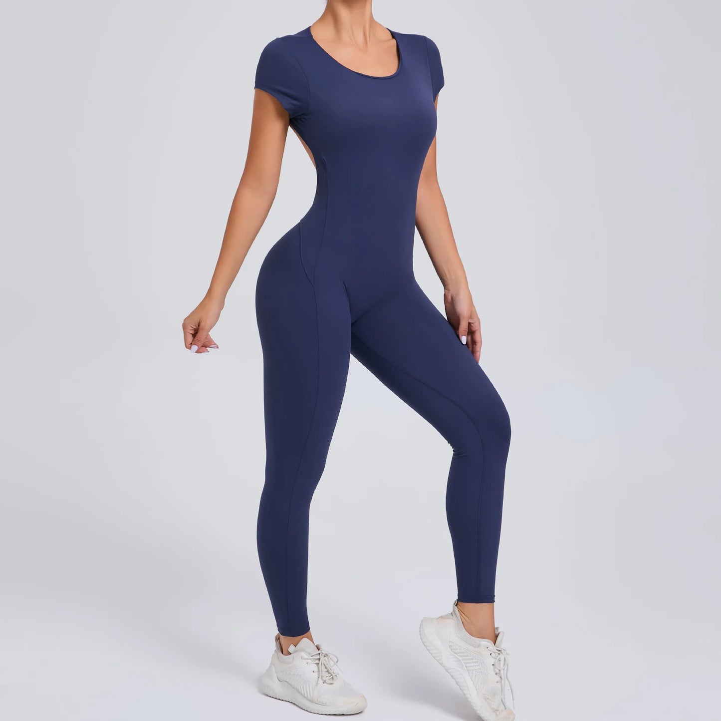 Short-Sleeve Cut-Out Sculpt Jumpsuit - One Piece. Total Freedom.