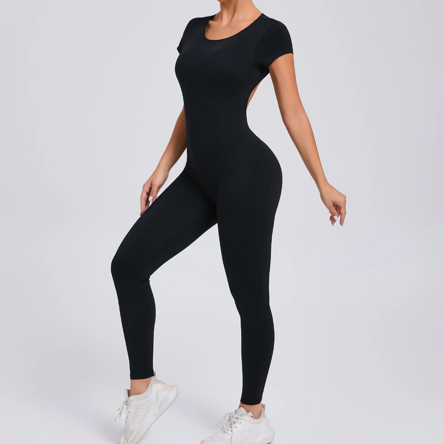 Short-Sleeve Cut-Out Sculpt Jumpsuit - One Piece. Total Freedom.