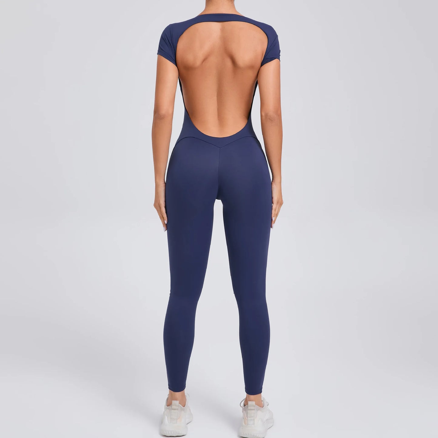 Short-Sleeve Cut-Out Sculpt Jumpsuit - One Piece. Total Freedom.