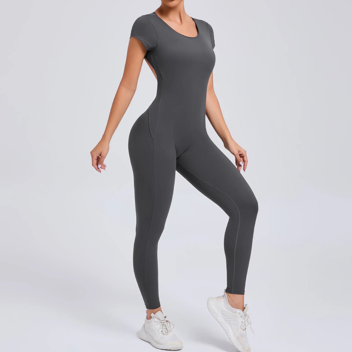 Short-Sleeve Cut-Out Sculpt Jumpsuit - One Piece. Total Freedom.