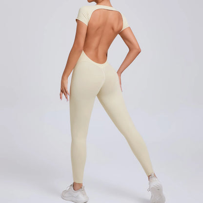 Short-Sleeve Cut-Out Sculpt Jumpsuit - One Piece. Total Freedom.