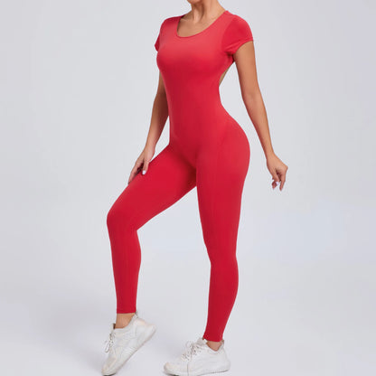 Short-Sleeve Cut-Out Sculpt Jumpsuit - One Piece. Total Freedom.