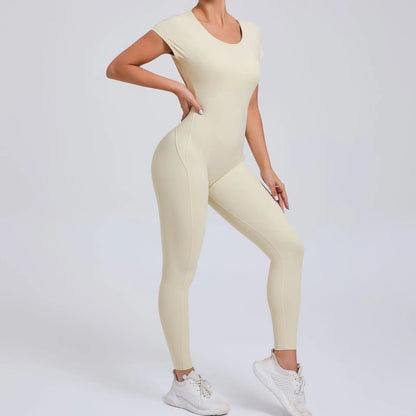 Short-Sleeve Cut-Out Sculpt Jumpsuit - One Piece. Total Freedom.