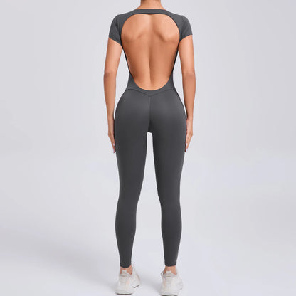 Short-Sleeve Cut-Out Sculpt Jumpsuit - One Piece. Total Freedom.
