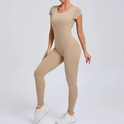 Short-Sleeve Cut-Out Sculpt Jumpsuit - One Piece. Total Freedom.