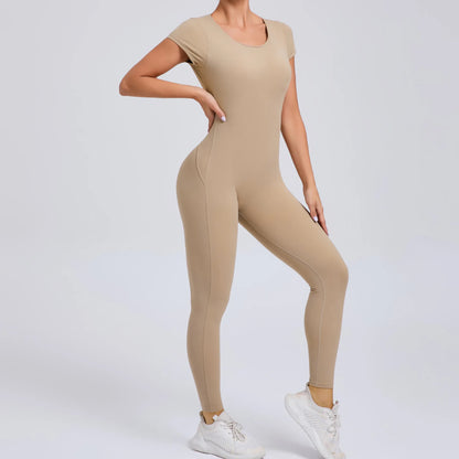 Short-Sleeve Cut-Out Sculpt Jumpsuit - One Piece. Total Freedom.