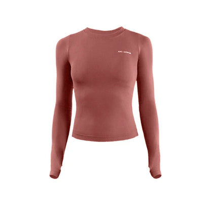 Seamless Long-Sleeve Gym Tee - Sleek. Sculpted. Stay-Put.