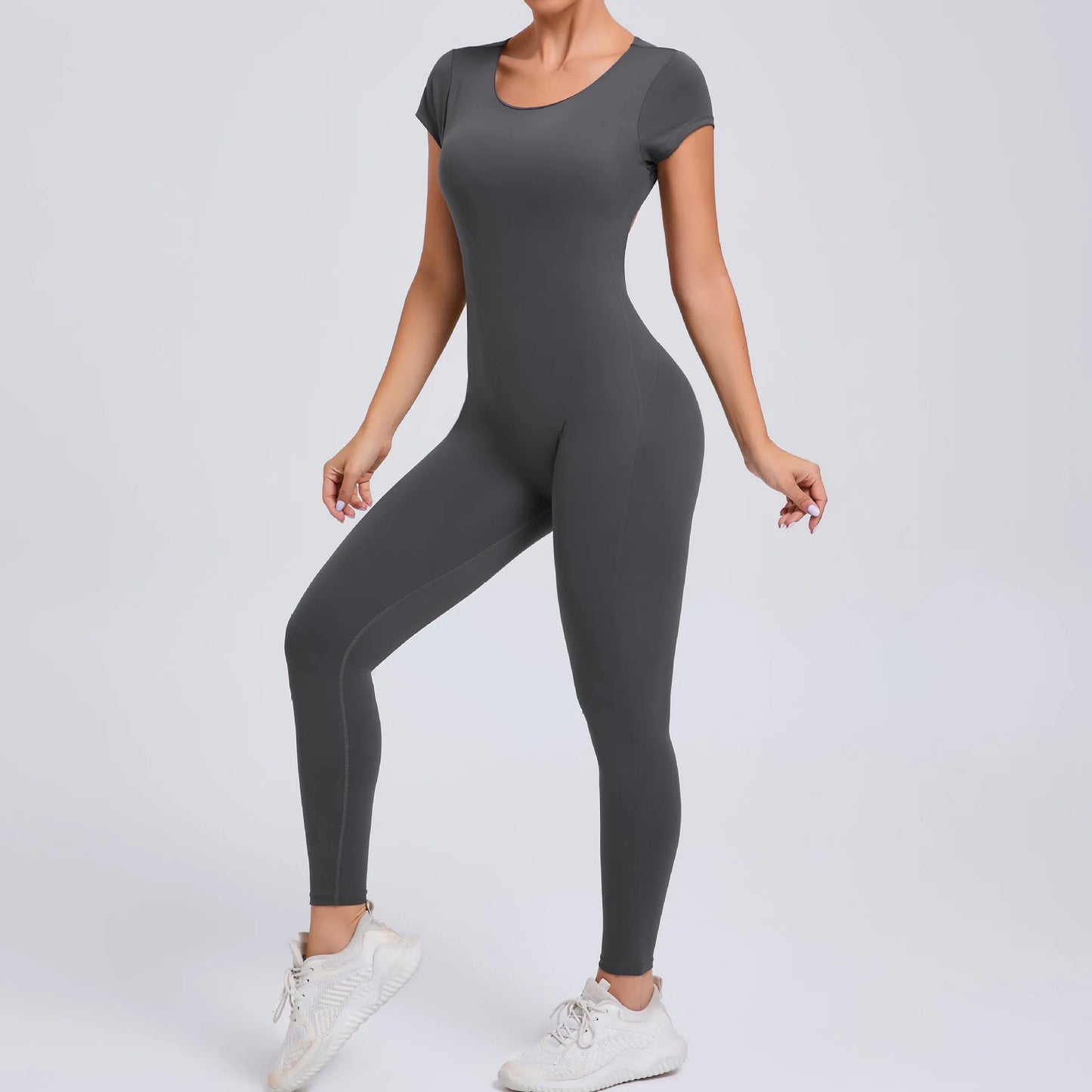 Short-Sleeve Cut-Out Sculpt Jumpsuit - One Piece. Total Freedom.