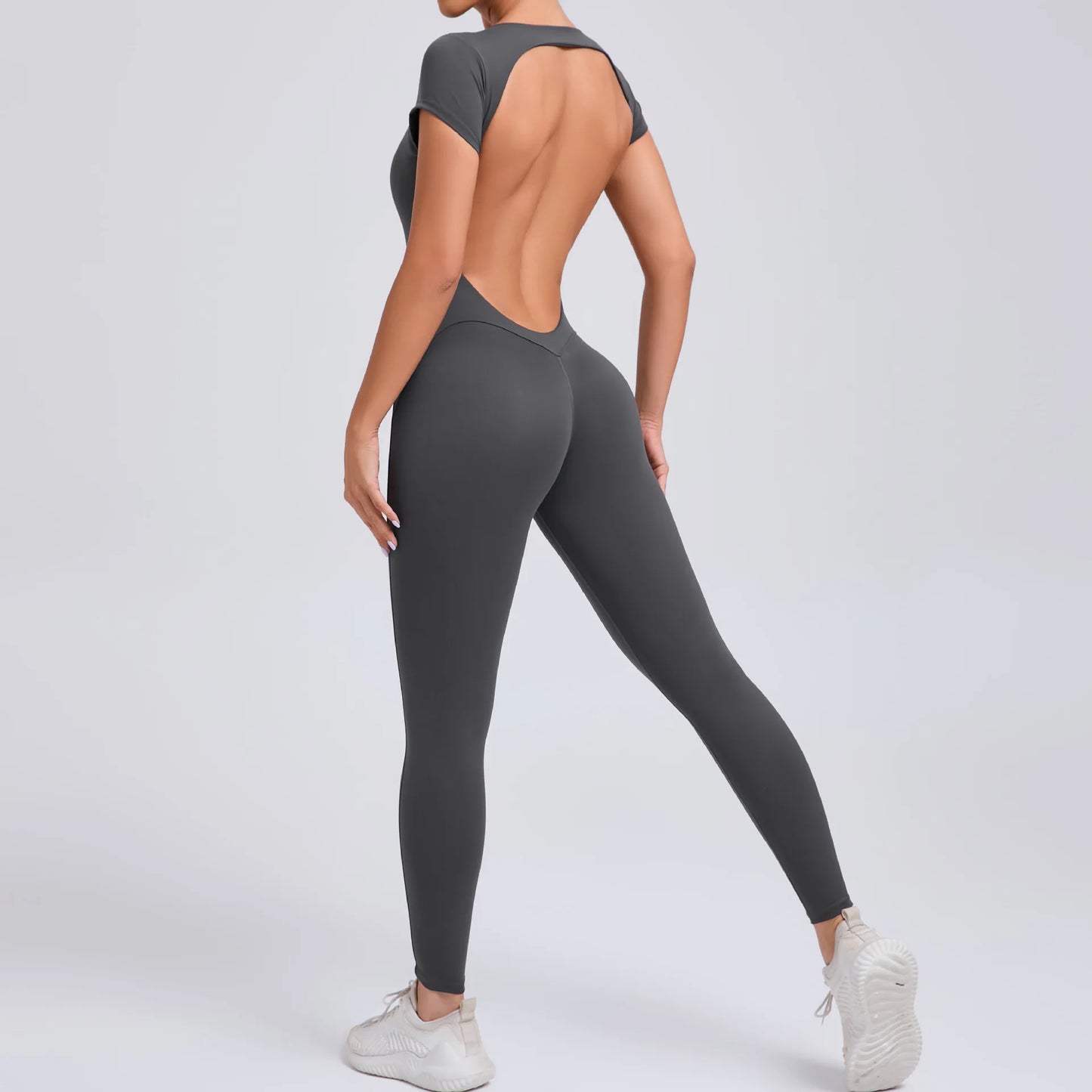 Short-Sleeve Cut-Out Sculpt Jumpsuit - One Piece. Total Freedom.