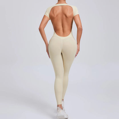 Short-Sleeve Cut-Out Sculpt Jumpsuit - One Piece. Total Freedom.